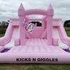 Pink double slide bouncy castle